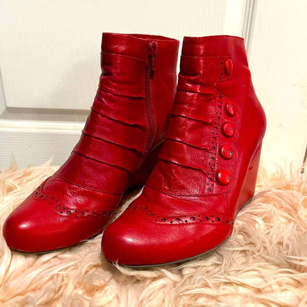 Adorable wedge, red leather bootie. Fits like a size 8. Worn 3x.